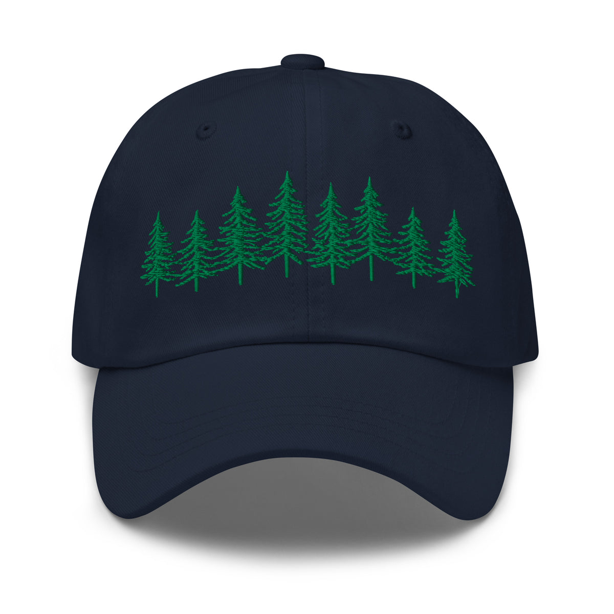 Navy Into the Pines baseball hat by Klemm & Co., featuring the embroidered pine tree design on the front in green thread.