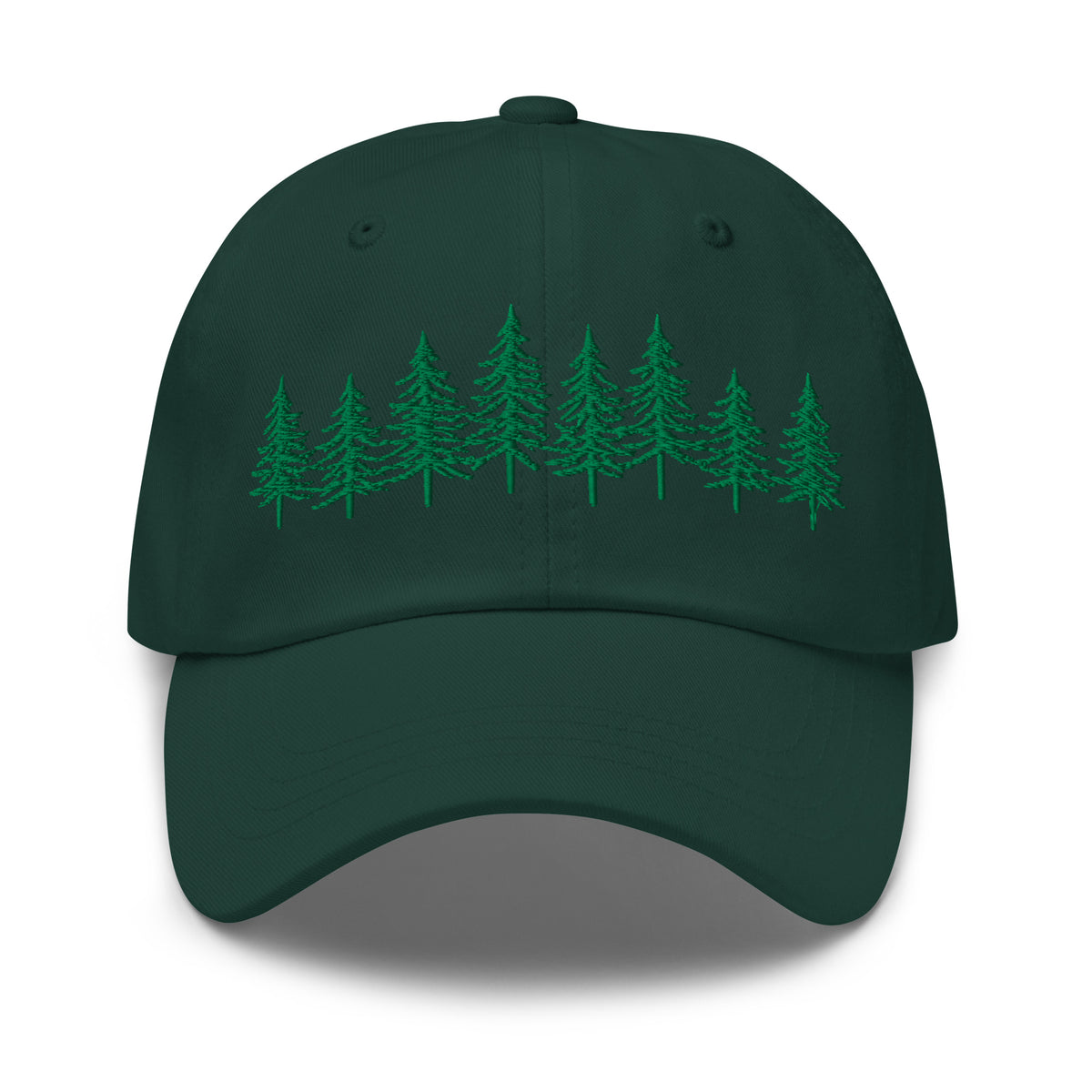 Green Into the Pines baseball hat by Klemm & Co., featuring a pine tree design embroidered in green thread on the front.