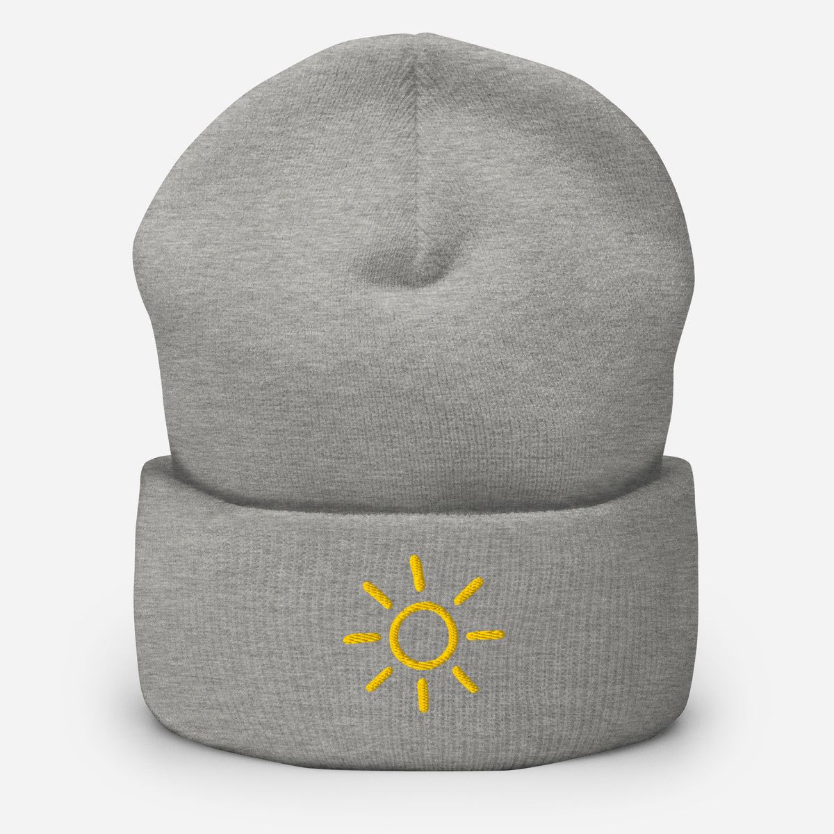 Light grey Sun embroidered toque by Klemm & Co., featuring a minimalist sun design embroidered in gold thread.