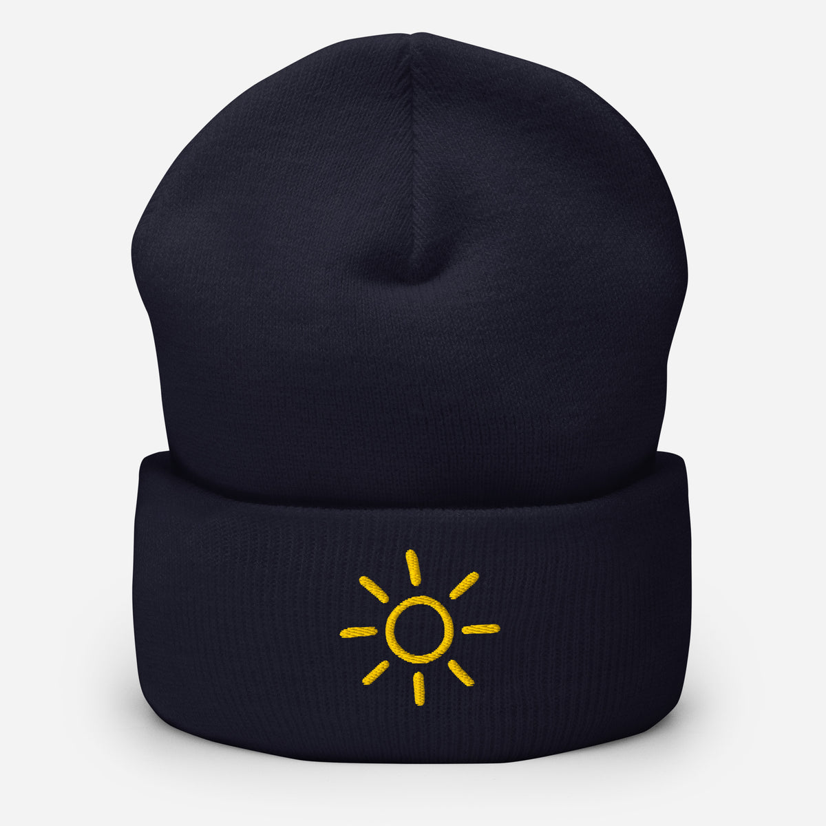 Navy Sun embroidered toque by Klemm & Co., featuring a minimalist sun design embroidered in gold thread.