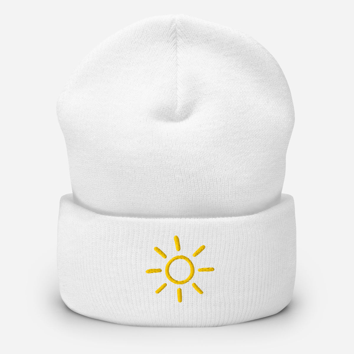 White Sun embroidered toque by Klemm & Co., featuring a minimalist sun design embroidered in gold thread.