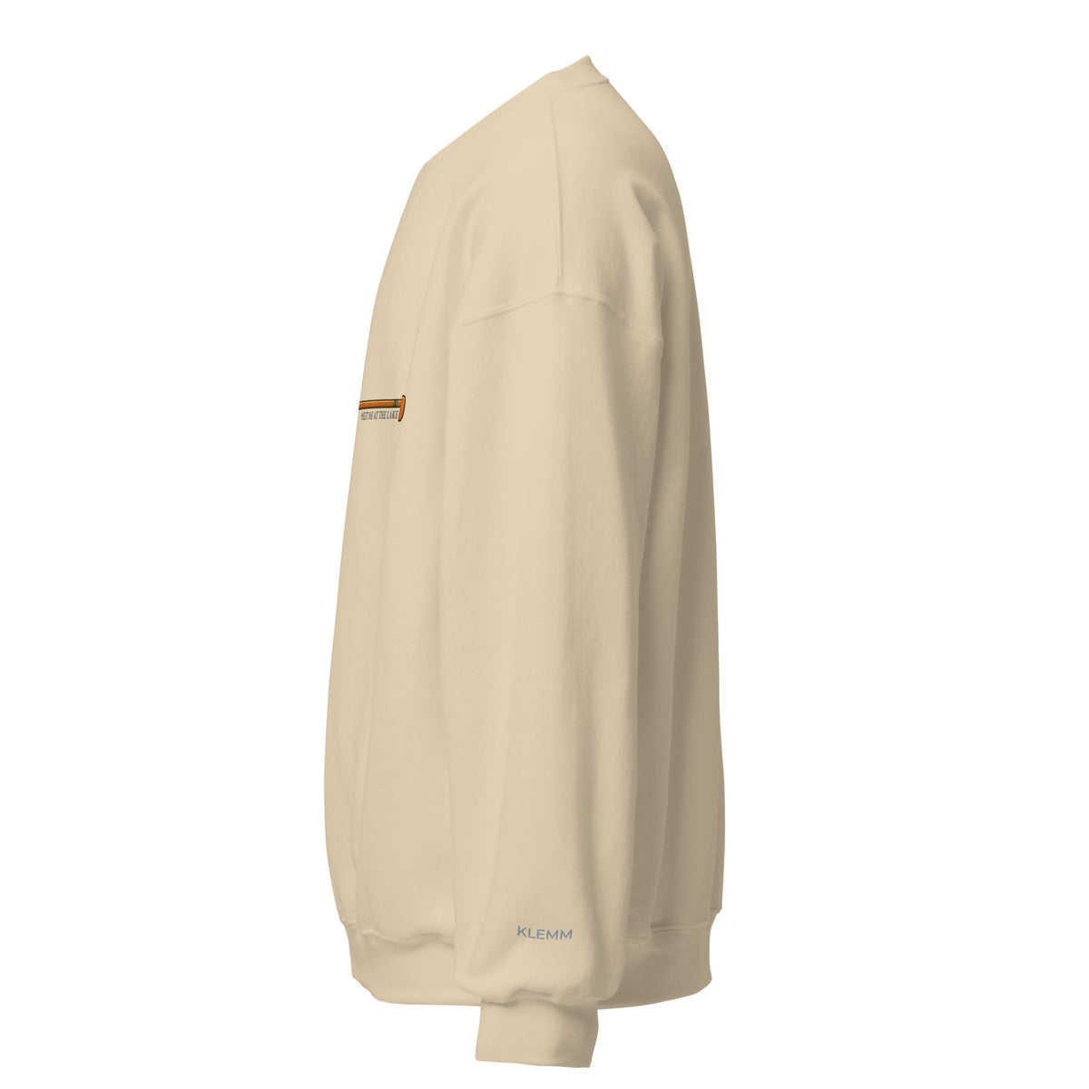 Left side view of the sand Meet Me at the Lake crewneck sweatshirt by Klemm & Co., showing KLEMM embroidered in grey thread on the sleeve.