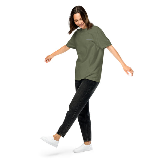 Female model wearing the moss Rock Your Soul T-shirt by Klemm & Co., front-left view showing ROCK YOUR SOUL embroidered in grey thread.