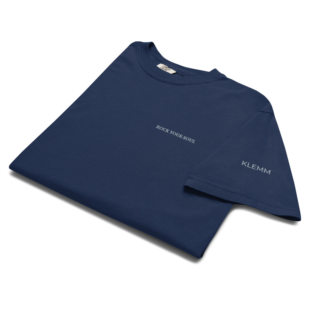 Folded navy Rock Your Soul T-shirt by Klemm & Co., showing KLEMM embroidered in grey thread on the sleeve.