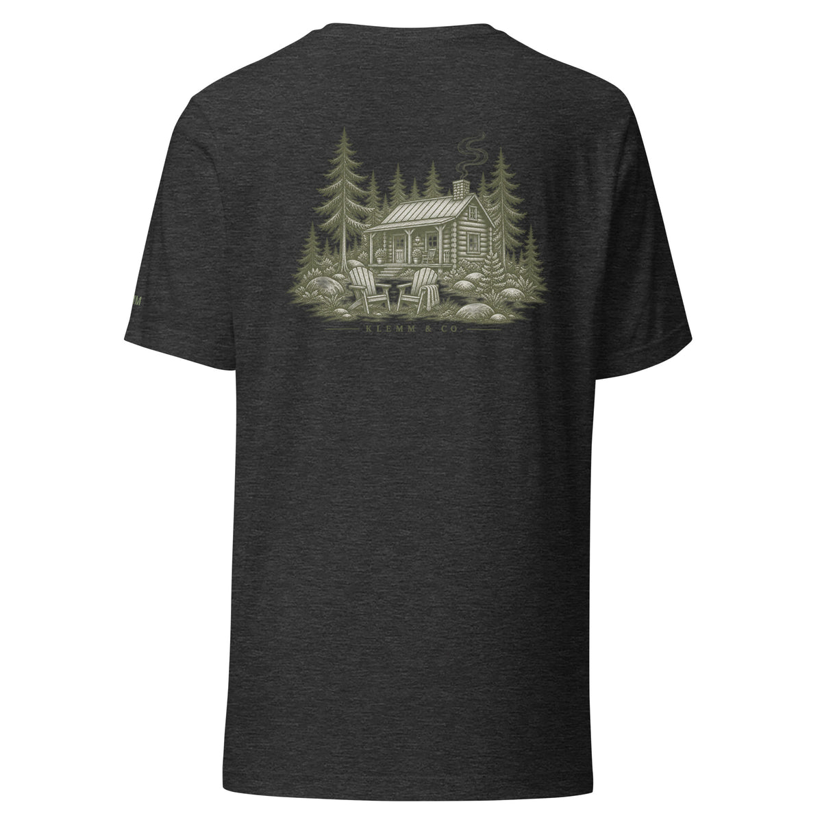 Dark grey Meet Me at the Cabin graphic T-shirt by Klemm & Co., back view with an olive woodland cabin and pine tree design.