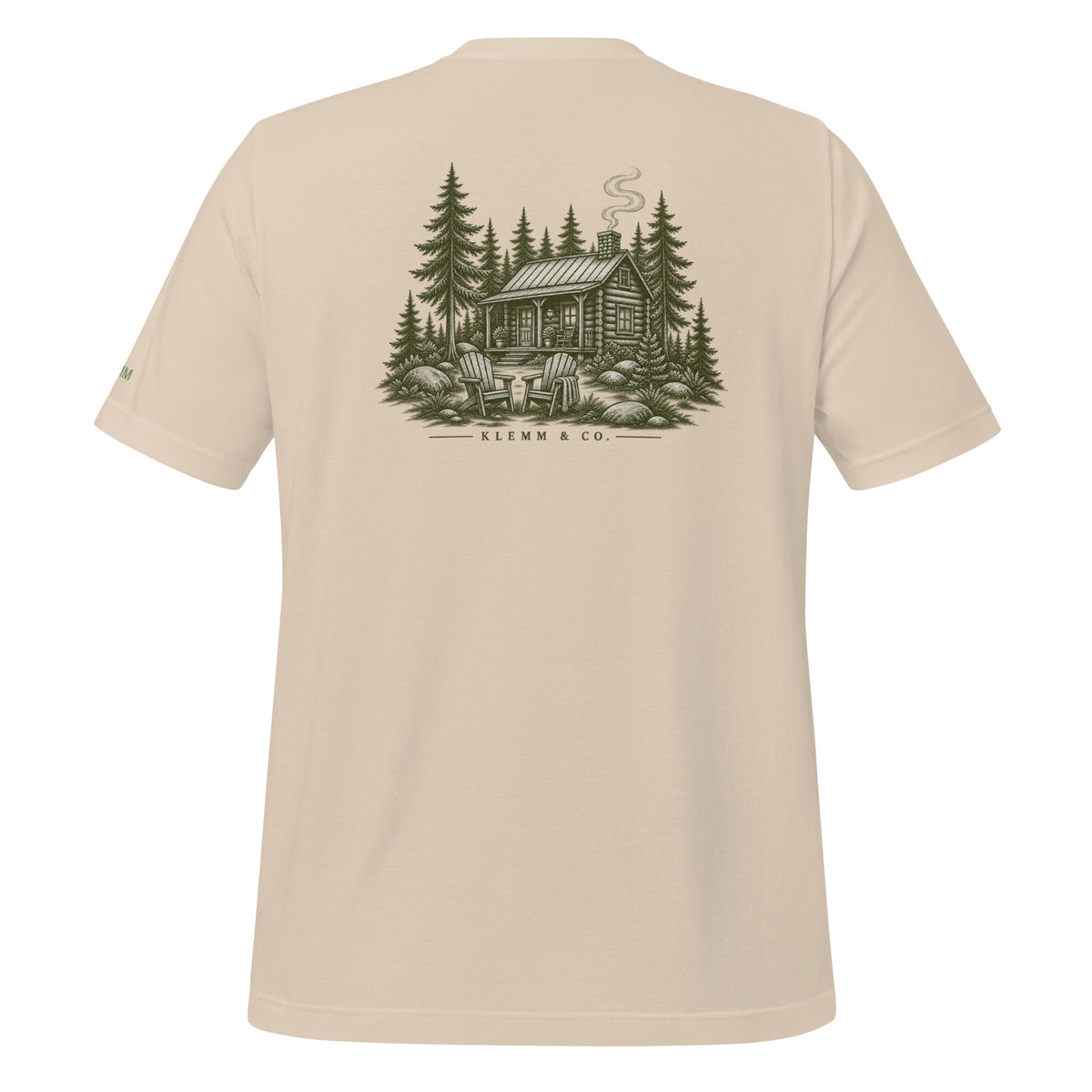 Soft cream Meet Me at the Cabin graphic T-shirt by Klemm & Co., back view with a woodland cabin and pine tree design.
